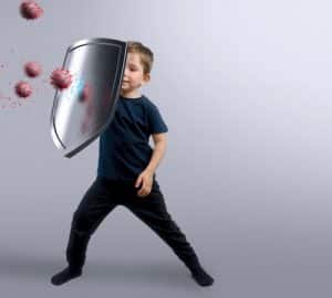 bambino con scudo combatte virus