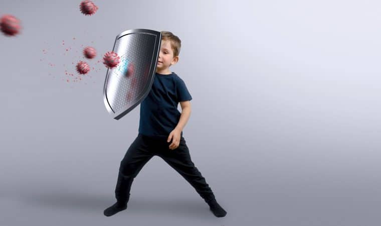 bambino con scudo combatte virus